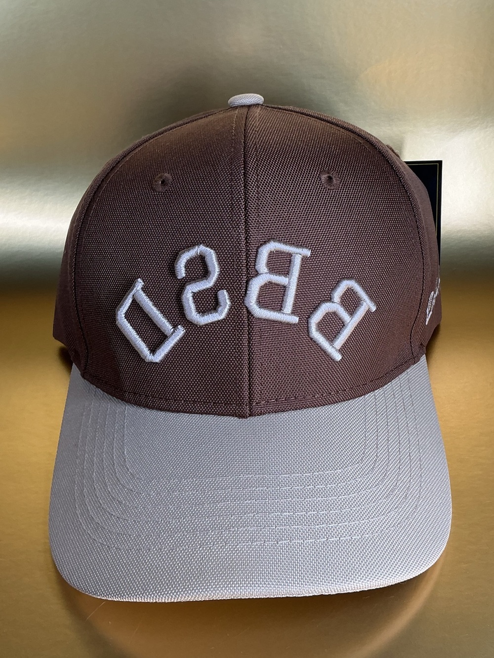 Invicta Brown & Beige Baseball Cap with White Raised backwards Letters BBSD
